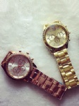 Alloy watch with 3 imitation eyes on dial